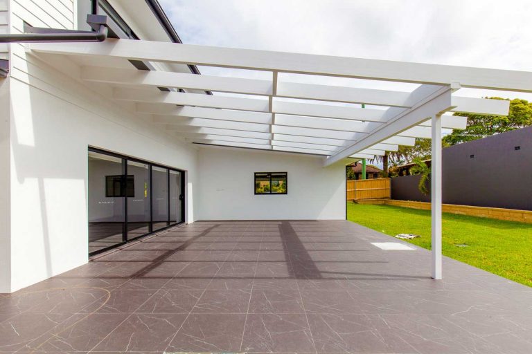 The tiling throughout the ground floors of this Northern Beaches duplex extends to the outdoor entertainment area.